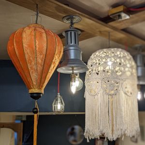 Lamps in the bookshop area at Pot & Page in Ledbury