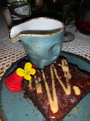 Chocolate brownie and cream at Pot & Page in Ledbury