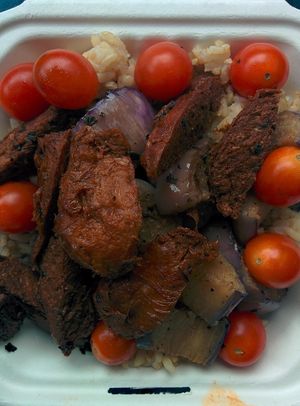 Adobo: The most popular dish of the Philippines! Soy chicken strips fried to a crisp, combined with soft eggplant then cooked in a marinade of soy sauce, vinegar, bay leaves, garlic, salt and pepper. at No Worries Cuisine in Oakland