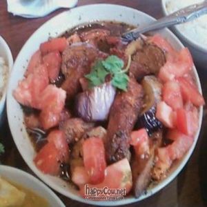 soy chicken adobo at No Worries Cuisine in Oakland