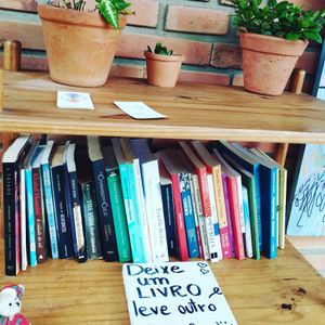 Espaço para troca de livros at Girassol Veg in Florianopolis
