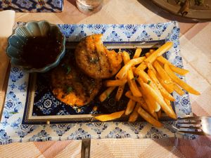 Vegan burgers w/ frenchfries and hot sause at The Passing in Crete