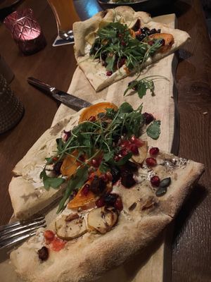 Veganized Pinsa (with soy yogurt instead of crème fraîche) with beets, sweet potato, arugula and pomegranate   at Landwehr - Bräu am Turm in Rothenburg Ob Der Tauber