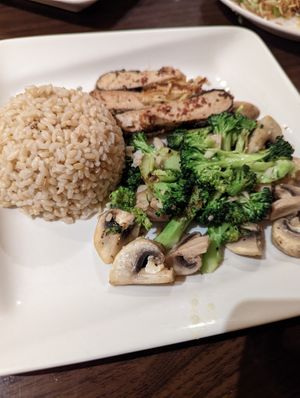 Veggie feast (Pan fried vegan fish with ginger and sauteed mushroom garlic with broccoli, served with rice.) at Simple Joy in Honolulu