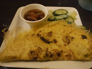 Sizzling pankake - Vietnamese pancake, rice flour with bean sprouts, tofu, mushroom, and broccoli, serve with home made vegan fish sauce. at Simple Joy in Honolulu