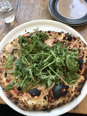 Vegan cheese & custom toppings! This is the regular crust but they also have great gluten free options and lots of vegan toppings😄 at Crosscut Pizzeria and Taphouse in Nederland