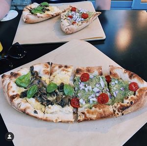 Vegan truffle pizza (with vegan cheese) and vegan avocado pizza at Smak. Athens in Athens