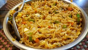 Vegetable fried rice (R$22), vegan by default. Savory and tasty. Addictive. at Tempero Indiano in Sao Paulo