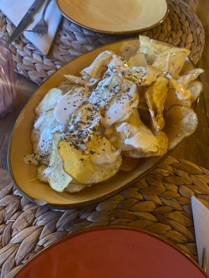 Patatas fritas con tahini, limon y oregano  at Esfigueral in Ibiza