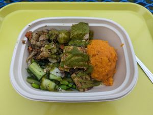 Tofu, seasonal lemon-herb vinaigrette, sweet potato, cucumber salad, roasted veggies at Maepole in Atlanta