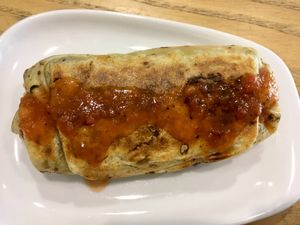 Poblano and rice burrito with hot sauce.  at Cartel Coffee Lab - Downtown Phoenix in Phoenix