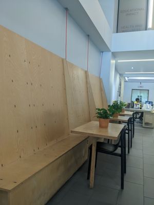 Seating in shared hallway at Cartel Coffee Lab - Downtown Phoenix in Phoenix