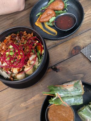 Gao bowl, spring rolls and vegan chicken wings at GAO Vegan in Leipzig