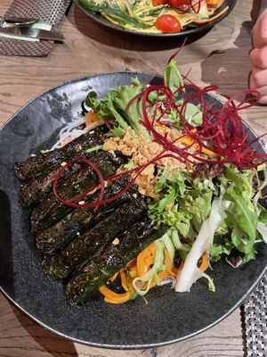 Rice noodles, vegetables and rolls filled with tofu/mushroom   at GAO Vegan in Leipzig