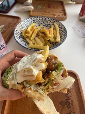 I forgot to ask for no yogurt sauce so this wrap was veg. Otherwise it’s served with ketchup  at Ya Mas in Vlore