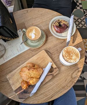 Almond croissant 🥐+ soy chai latte / Chocolate-hazelnut donut  🍫 🍩 + oat cappuccino at Knead a Little Love in East London