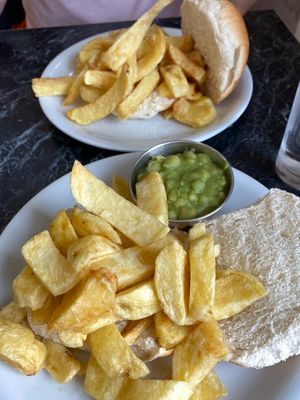 Chip butty with mushy peas at Neptune Fish Restaurant in Seahouses