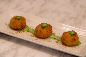 vegan croquettes with a spinach creme sauce at Atabey Condado in San Juan