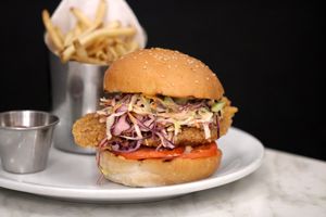 crispy vegan chicken sandwich vegan aioli slaw pan de aqua roll at Atabey Condado in San Juan