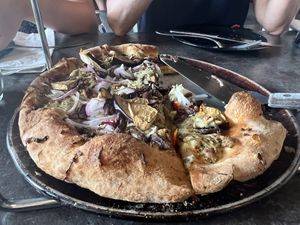 Sorry can’t remember but eggplant I think was gluten free as well  at Black Rock Pizza in Captain Cook