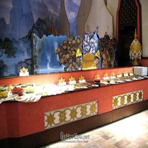 Wide shot of Asian vegetarian buffet (salads on the left) at Golden Kinnaree Buffet Restaurant in Phuket