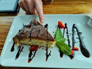Vegan dessert - this day it was a huge chunk of pistachio cake at Tribo da Praia in Ferrel