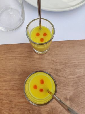 Amuse bouche (corn soup with chilly oil) at 5SENSES Restaurant in Santorini