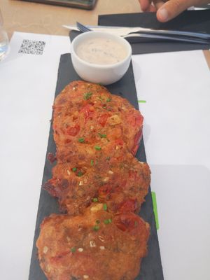 Appetizer tomatoes, onion fried balls at 5SENSES Restaurant in Santorini