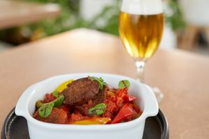 Spetzofai and beer goes together! at 5SENSES Restaurant in Santorini