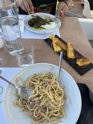 Rolled eggplant, fried cheese and carbonara - not pictured are the x2 glass of red and rose and mojito  at 5SENSES Restaurant in Santorini