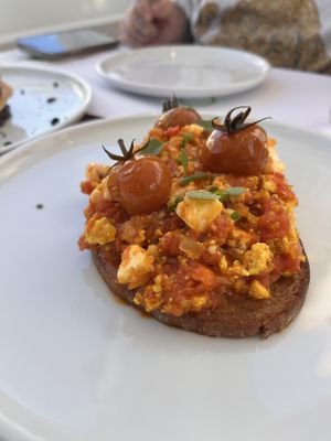 Kayanas “soft scrambled egg” it honestly taste even 10x better than it looks. Full of flavor and the protein mixed with the cheese and bread at the bottom is pretty filling.  at 5SENSES Restaurant in Santorini