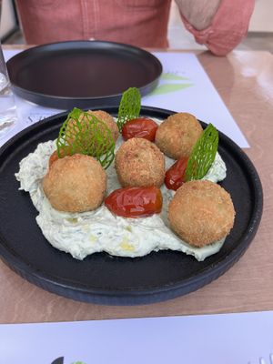 Potato croquettes. Good herb cream sauce, but the croquettes themselves were like glue.   at 5SENSES Restaurant in Santorini