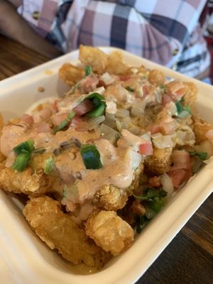 Loaded southwest tater tots  at Project Pollo - Anderson Lane in Austin