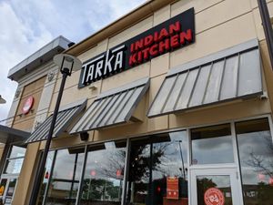 Outdoor seating available, albeit in the full morning sun. at Tarka Indian Kitchen in Cedar Park