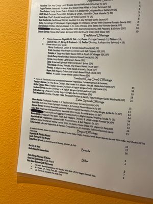 Menu on wall. No scanning. Yay!!! Clearing marked what is vegan, gluten free, dairy free at Zaika Indian Cuisine in Colorado Springs