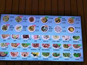 Menu behind register. at Even Noodles Sing 碗阳春 in Shanghai