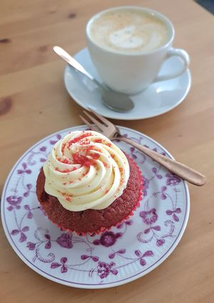 Red velvet cupcake & cappuccino at Superhero Records in Berlin