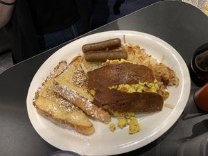 Breakfast with french toast and hash at Champs Diner in Brooklyn