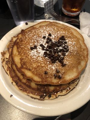Chocolate pancakes, great texture & flavor!  at Champs Diner in Brooklyn