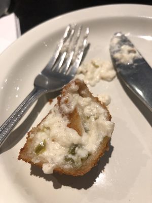 Inside of jalapeño poppers, not too spicy and they came out hot & fresh   at Champs Diner in Brooklyn