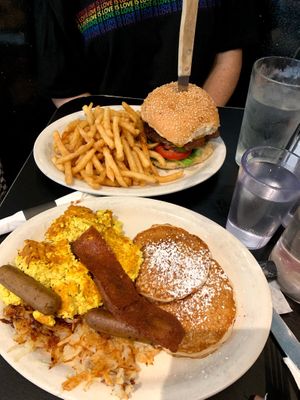 Breakfast slam and burger with fries at Champs Diner in Brooklyn