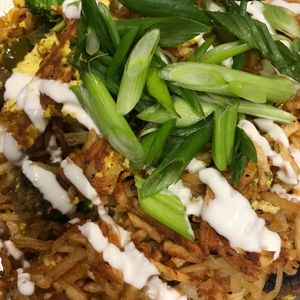 Hash browns with tofu scramble and soy sausages  at Champs Diner in Brooklyn