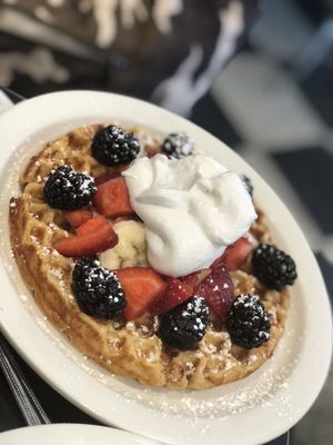 Belgian Waffle with Berries, Bananas, and whipped cream  at Champs Diner in Brooklyn