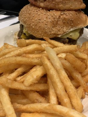 Mondo burger with fries  at Champs Diner in Brooklyn