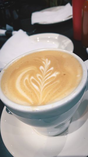 Latte with oat milk at Champs Diner in Brooklyn