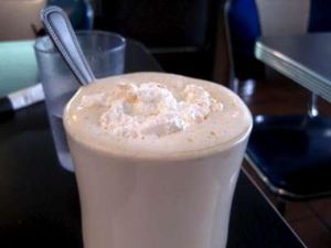 Coffee with whipped cream... the cream is really good. at Champs Diner in Brooklyn