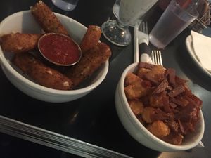 Mozzarella sticks and seiten chili tots at Champs Diner in Brooklyn