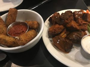 Buffalo wings and mozzarella sticks  at Champs Diner in Brooklyn
