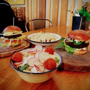 My husband got vegetarian fries with cheese etc toppings, along with his vegan burger. He liked them. I got the vegan Habibi salad in a small size to go with my burger.  at Submarine Burgers in Zadar