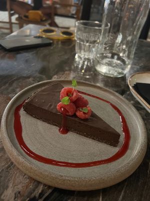 Chocolate torte, the base was like tolberone! Highly recommend  at Almond in Paros